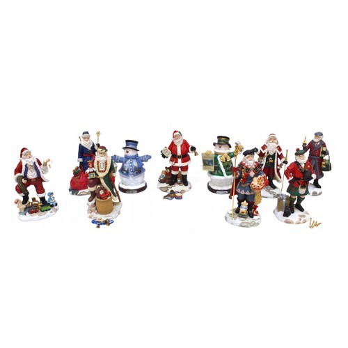 137 - A collection of assorted model Santa Claus figures from the International Santa collection, and two ... 