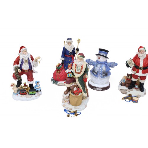 137 - A collection of assorted model Santa Claus figures from the International Santa collection, and two ... 