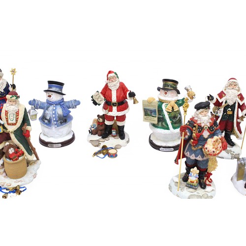 137 - A collection of assorted model Santa Claus figures from the International Santa collection, and two ... 