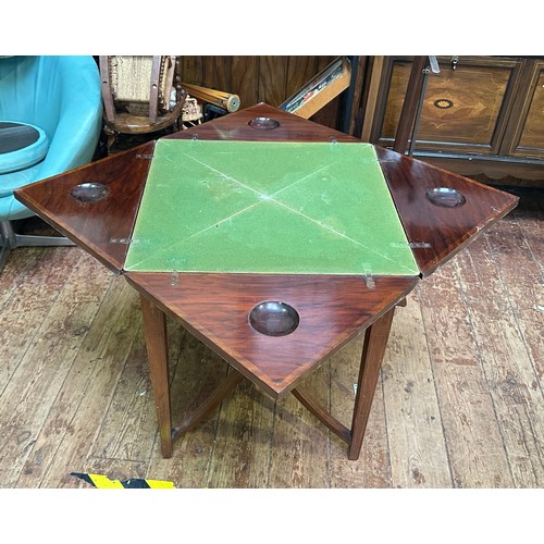 644 - An Edwardian rosewood envelope card table, of typical form, with inlaid top, enclosing green playing... 