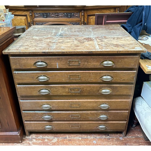 649 - A six-drawer oak and oak veneered map chest of six drawers, 95cm wide.