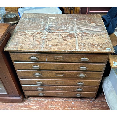 649 - A six-drawer oak and oak veneered map chest of six drawers, 95cm wide.