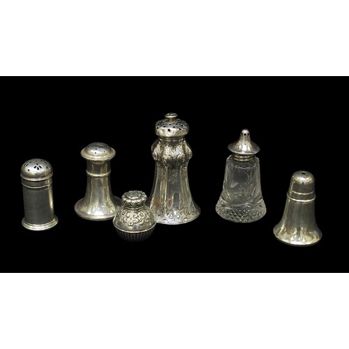 184 - A Victorian silver pepper pot, worn hallmarks, Sheffield, c.1850s, star pierced lid, the fluted body... 