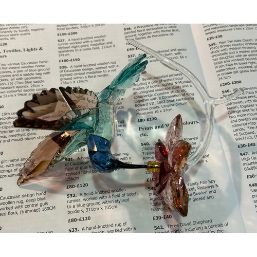 140 - A boxed Swarovski Crystal figure ‘Hummingbird’, from the Crystal Paradise Birds collection, no. 5461... 