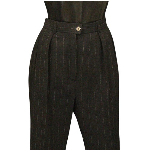 69 - Designer & High Street Fashion: A collection of twelve garments, 
the majority in black colour, incl... 