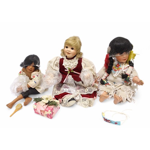 438 - Ten various boxed bisque dolls and marionettes, comprising Alberon, The Hamilton Collection, Das Pup... 