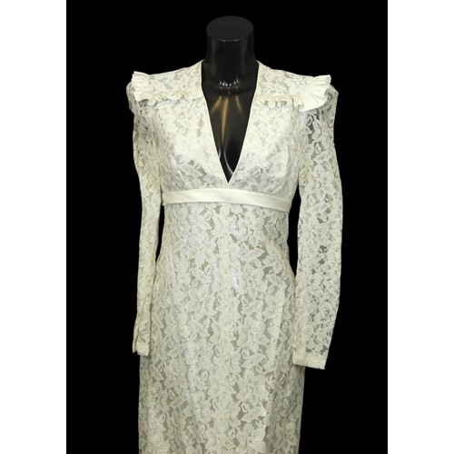 111 - Stage Wear / Evening Wear: Three garments, 
c. 1970s, 
including: a white maxi dress, of floral net ... 