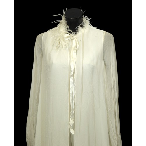 111 - Stage Wear / Evening Wear: Three garments, 
c. 1970s, 
including: a white maxi dress, of floral net ... 