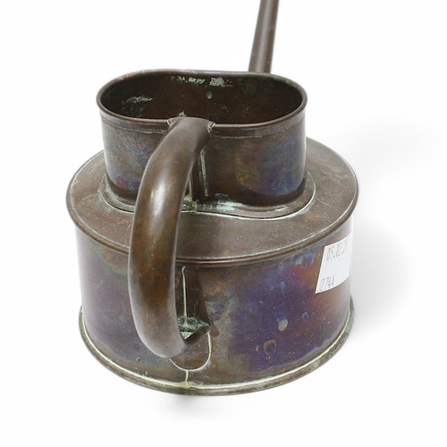 375 - Two graduated vintage copper and brass watering cans by Haws, largest measures 38cm long.