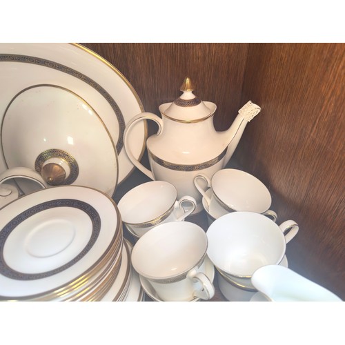 28 - A Royal Doulton ‘Harlow’ pattern part tea and dinner service, comprising two teapots, cups and sauce... 