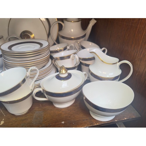 28 - A Royal Doulton ‘Harlow’ pattern part tea and dinner service, comprising two teapots, cups and sauce... 