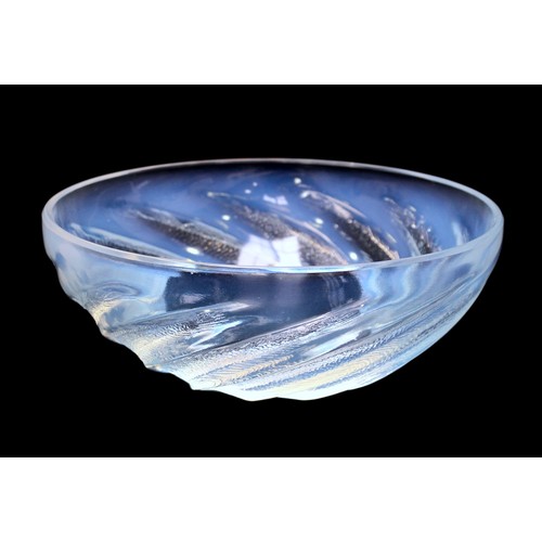 49 - René Lalique (French, 1860 - 1945) A ‘Poissons’ opalescent glass bowl, designed circa 1921, with etc... 