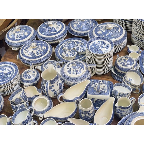 53 - An extensive collection of blue and white Willow pattern tea and dinner wares, in excess of 350 piec... 