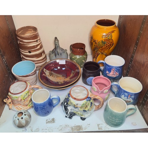 58 - A collection of 20th Century Isle of Wight studio pottery, comprising predominantly Jo Lester exampl... 