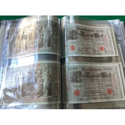 303 - Two albums containing approximately 90 world banknotes, but also a few British notes, cheques a 1910... 