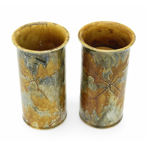 85 - A pair of Art Deco Royal Doulton ‘Autumn Leaves’ pattern cylinder vases, c.1924-27, signed ‘JH’, sta... 