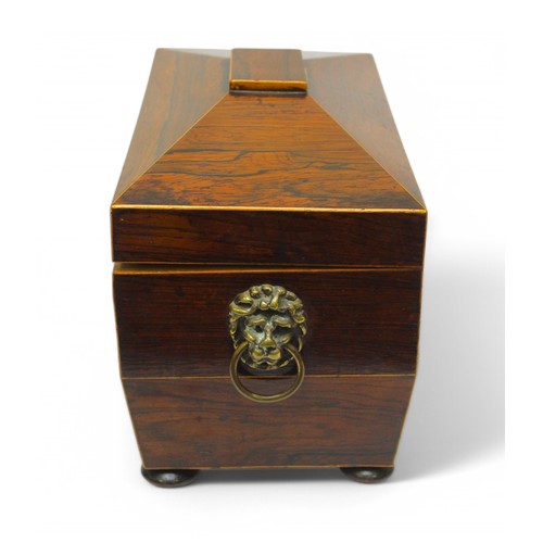 383 - A Victorian rosewood tea caddy, of sarcophagus form, the cover enclosing a fitted and lined interior... 