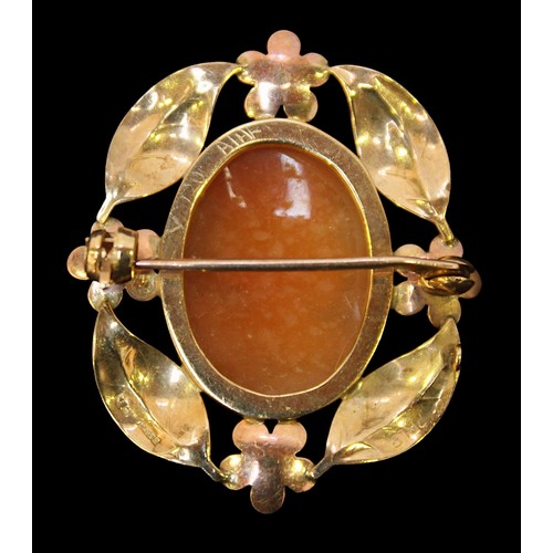 223 - A 9ct gold cameo brooch, relief carved with female figure, set in a 9ct yellow and rose gold foliate... 