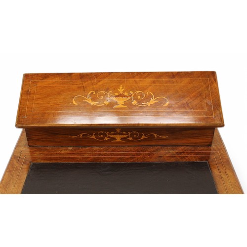 565 - An Edwardian inlaid mahogany table-top writing desk, the raised top enclosing a compartmented interi... 