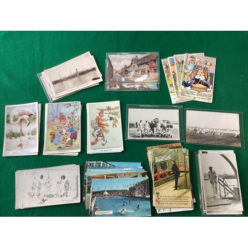 364 - A box of several hundred standard-size postcards, which include a good number of clean real photogra... 