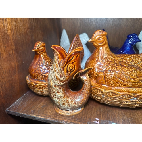 109 - Six Portmeirion 'hen on nest' casserole pots/egg holder, together with a Fosters Studio Cornwall 'Gl... 