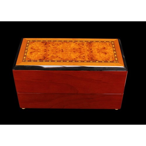 206 - A two watch ‘Perpetua’ winder box by Rapport, with burr walnut effect top, with fitted and lined int... 