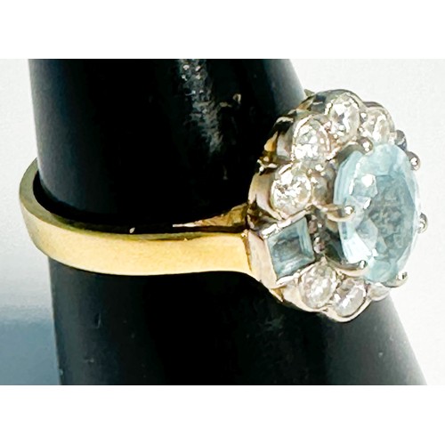 235 - An 18ct yellow gold dress ring, claw-set to the centre with an oval-shaped faceted aquamarine, estim... 