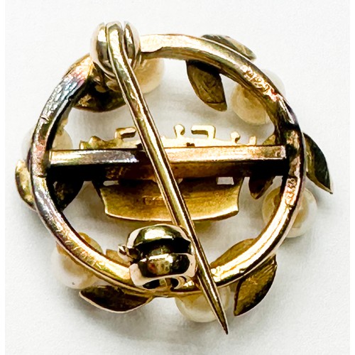 239 - A 9ct yellow gold naval brooch, set with six small white cultured pearls in a laurel wreath design, ... 