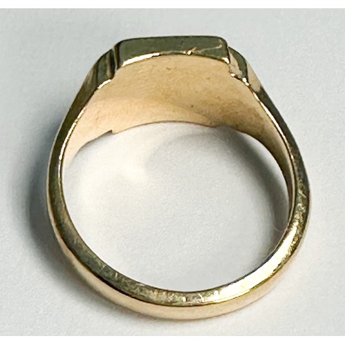 243 - A 9ct yellow gold signet ring with square top, ring weighs  7.6 grams.