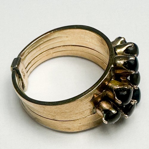 249 - A 14ct gold five band dress ring, secured with a gold band to the bottom of shank, each band is crow... 