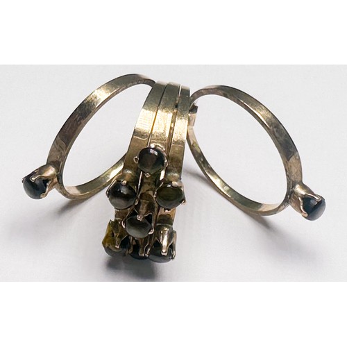 249 - A 14ct gold five band dress ring, secured with a gold band to the bottom of shank, each band is crow... 