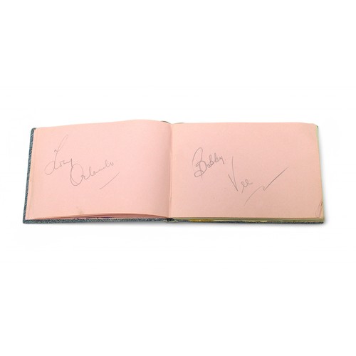 400 - An autograph book containing the signatures of Diana Dors, Bruce Forsyth, Bobby Vee, Tony Orlando, R... 