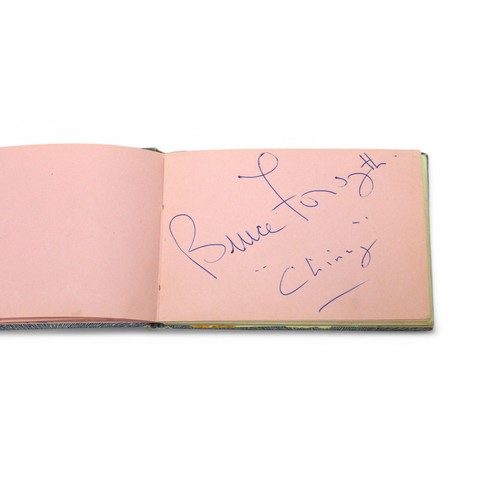 400 - An autograph book containing the signatures of Diana Dors, Bruce Forsyth, Bobby Vee, Tony Orlando, R... 