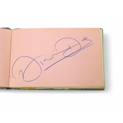 400 - An autograph book containing the signatures of Diana Dors, Bruce Forsyth, Bobby Vee, Tony Orlando, R... 