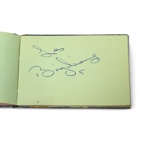 400 - An autograph book containing the signatures of Diana Dors, Bruce Forsyth, Bobby Vee, Tony Orlando, R... 