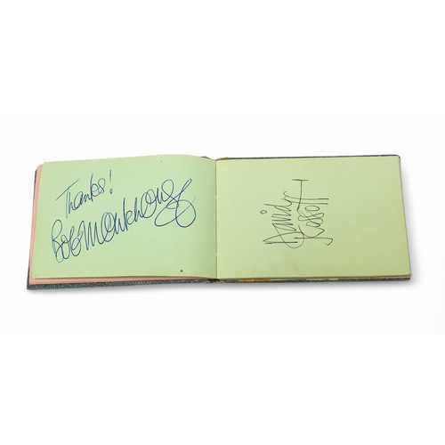 400 - An autograph book containing the signatures of Diana Dors, Bruce Forsyth, Bobby Vee, Tony Orlando, R... 