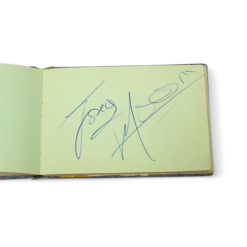 400 - An autograph book containing the signatures of Diana Dors, Bruce Forsyth, Bobby Vee, Tony Orlando, R... 