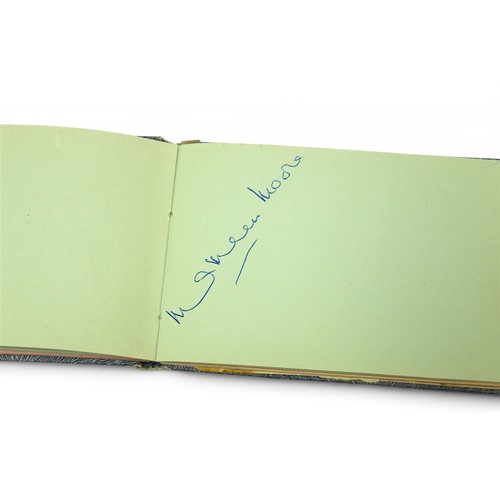 400 - An autograph book containing the signatures of Diana Dors, Bruce Forsyth, Bobby Vee, Tony Orlando, R... 