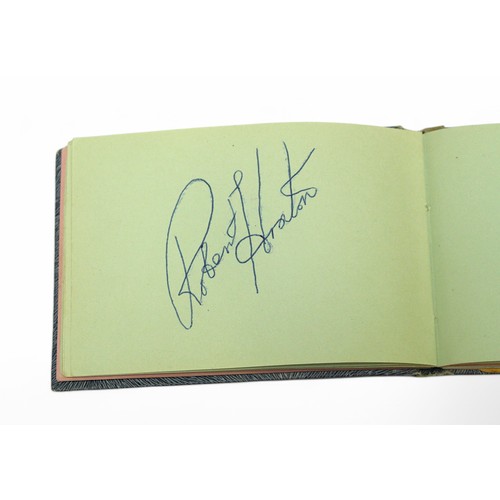 400 - An autograph book containing the signatures of Diana Dors, Bruce Forsyth, Bobby Vee, Tony Orlando, R... 