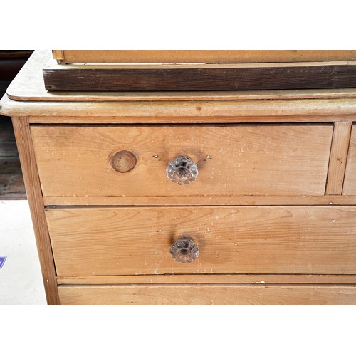 566 - A pine chest of two short, over two long graduated drawers, with clear glass pulls, 118cm long, toge... 