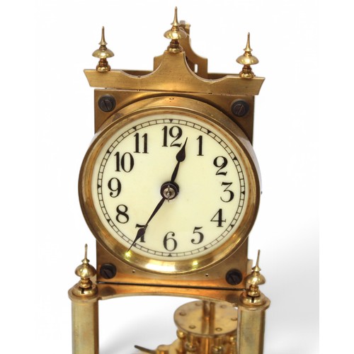 471 - Three various brass anniversary clocks with glass domes. (3)