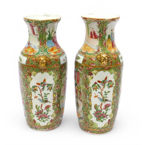 148 - A pair of 19th Century Chinese 'Canton' porcelain baluster vases with lion mask handles, painted wit... 