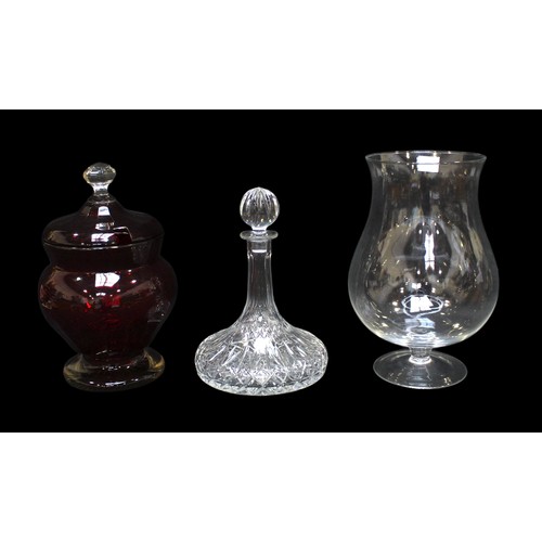 119 - A collection of eight assorted glass decanters, including a ships decanter and a pair of contemporar... 