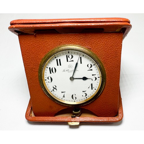 280 - An assortment of various coloured beads, together with a Tho Russell Sons travel clock in tan-colour... 