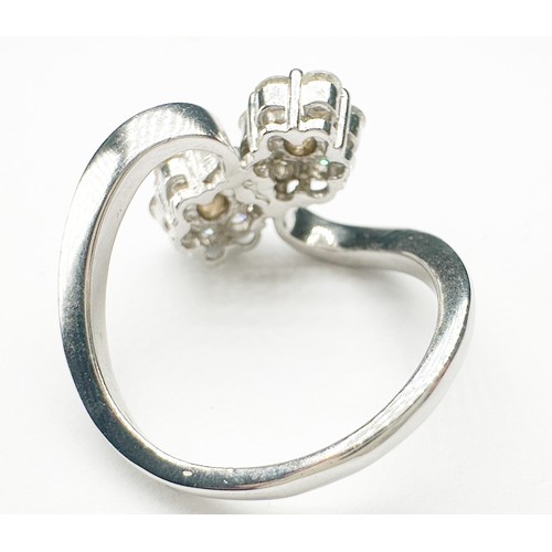 283 - An 18ct white gold double cluster diamond ring, set with 14 x round brilliant cut diamonds, estimate... 