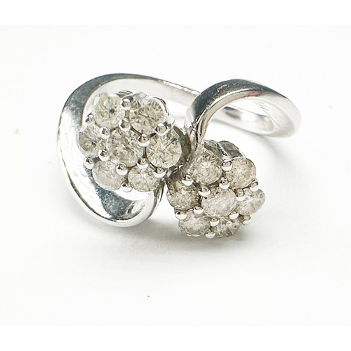 283 - An 18ct white gold double cluster diamond ring, set with 14 x round brilliant cut diamonds, estimate... 