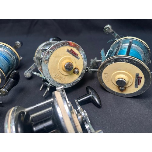 423 - Seven Mitchell multiplier fishing reels, including models: 600, 602 and 624.