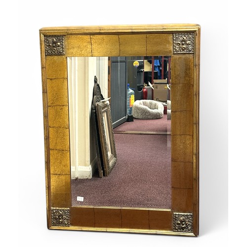 498 - Two gilt-framed rectangular bevelled mirrors, the larger with floral moulded decoration to corners o... 