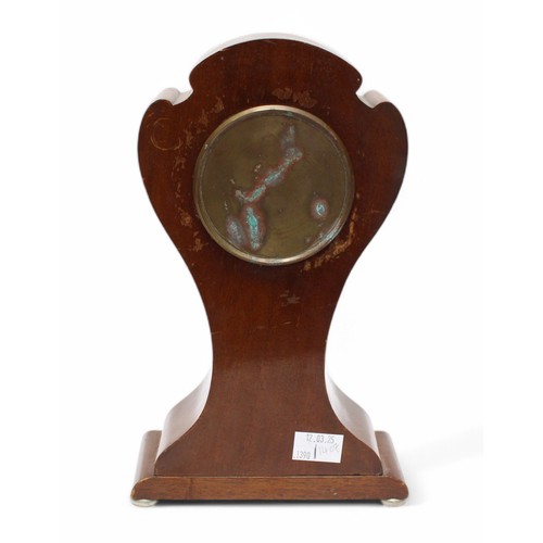 472 - A late Edwardian, Art Nouveau mahogany and silver mounted balloon cased mantel clock, the white enam... 