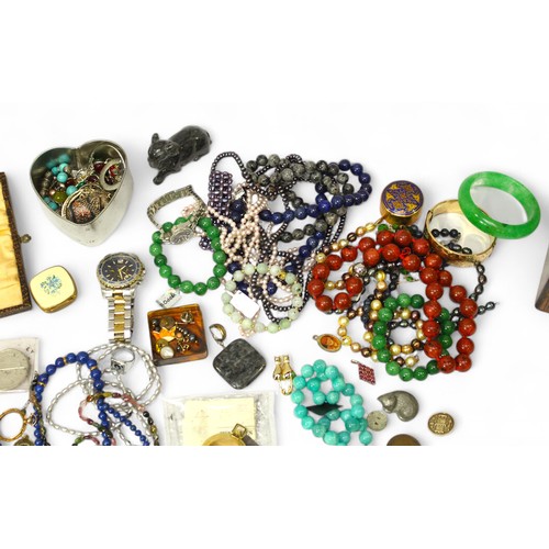 A collection of assorted costume jewellery including beads, chains ...